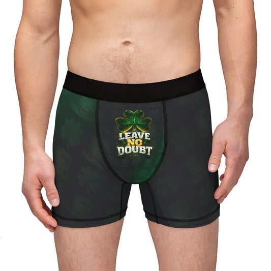 Black boxer briefs with green and white design and text on a white background